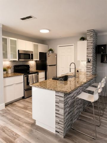 5463 VINELAND ROAD 5203, Orlando, FL 32811