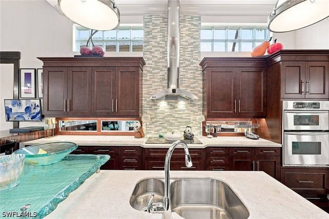 9154 Torrefino CT, Naples, FL 34109