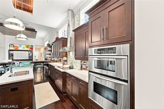 9154 Torrefino CT, Naples, FL 34109