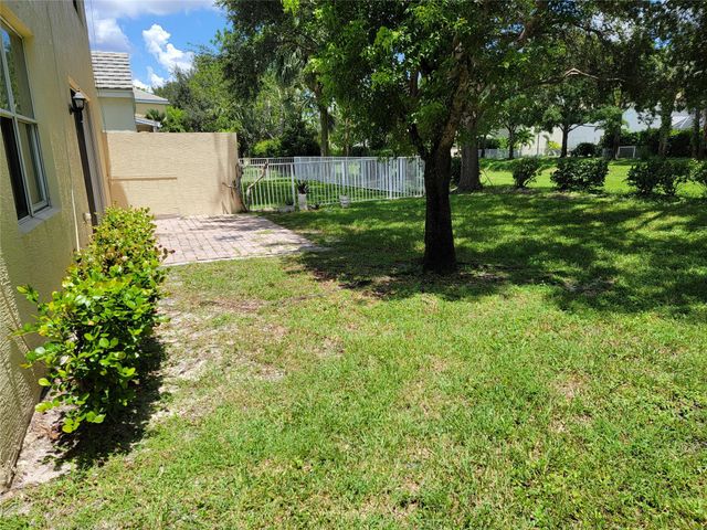 111 Berenger Walk, Royal Palm Beach, FL 33414