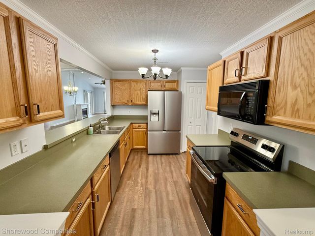 46116 Rhodes Drive, Macomb Township, MI 48044