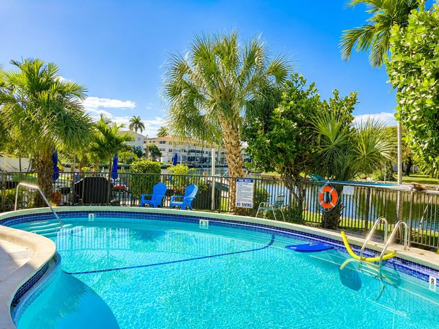 455 GOLDEN ISLES Drive 209, Hallandale Beach, FL 33009