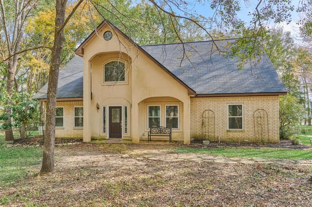 15012 Lake Paula Drive, Willis, TX 77318