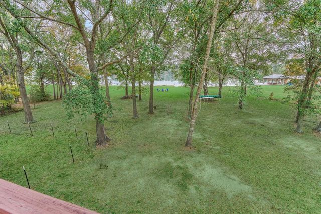 15012 Lake Paula Drive, Willis, TX 77318