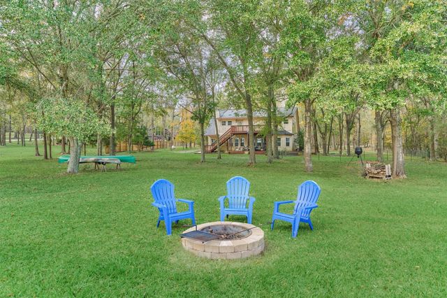 15012 Lake Paula Drive, Willis, TX 77318