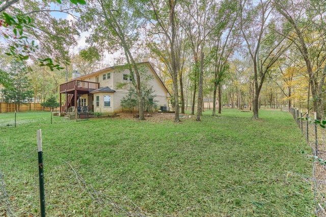 15012 Lake Paula Drive, Willis, TX 77318