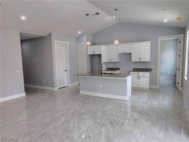 302 NW 25th AVE, Cape Coral, FL 33993