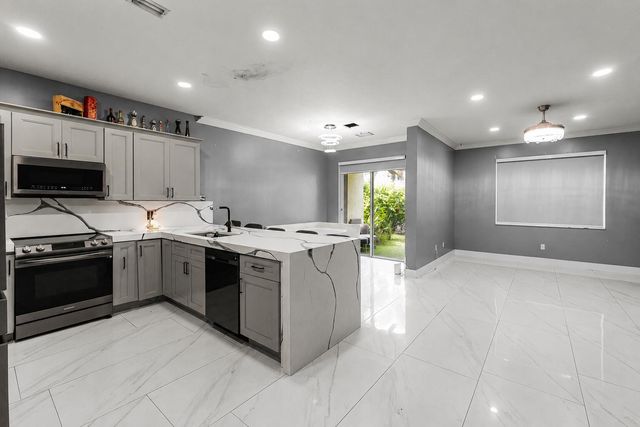 6119 Seminole Gardens Circle, Riviera Beach, FL 33418