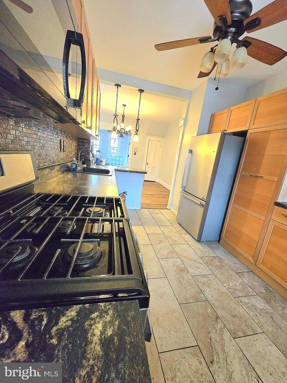 Image 6 of property listing at 2310 N LONGWOOD ST, Baltimore, MD 21216