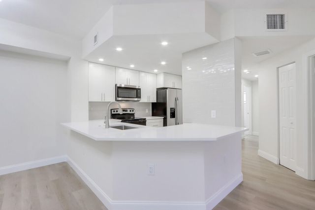 3023 Alcazar Place 207, Palm Beach Gardens, FL 33410