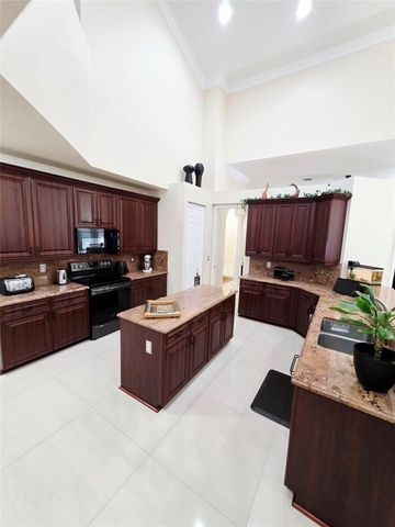 7107 Pinecreek Lane, Coconut Creek, FL 33073