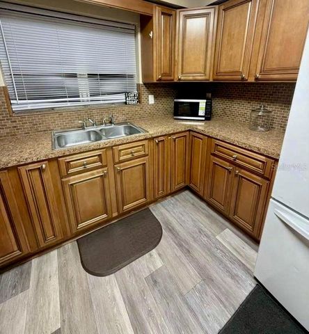 7815 PINE HILL DRIVE, Tampa, FL 33617