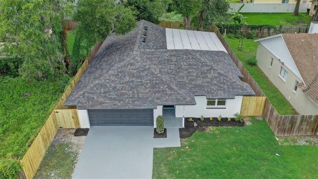 7711 LAKESIDE WOODS DRIVE, Orlando, FL 32810