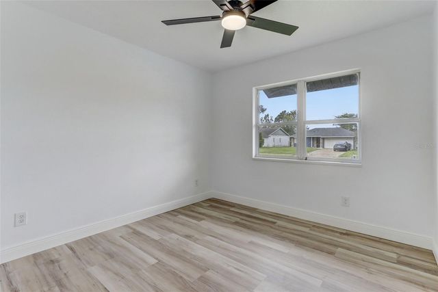 7711 LAKESIDE WOODS DRIVE, Orlando, FL 32810