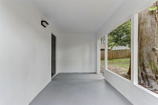 7711 LAKESIDE WOODS DRIVE, Orlando, FL 32810