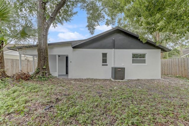 7711 LAKESIDE WOODS DRIVE, Orlando, FL 32810