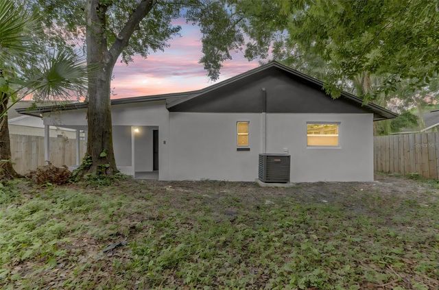 7711 LAKESIDE WOODS DRIVE, Orlando, FL 32810