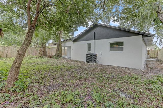 7711 LAKESIDE WOODS DRIVE, Orlando, FL 32810