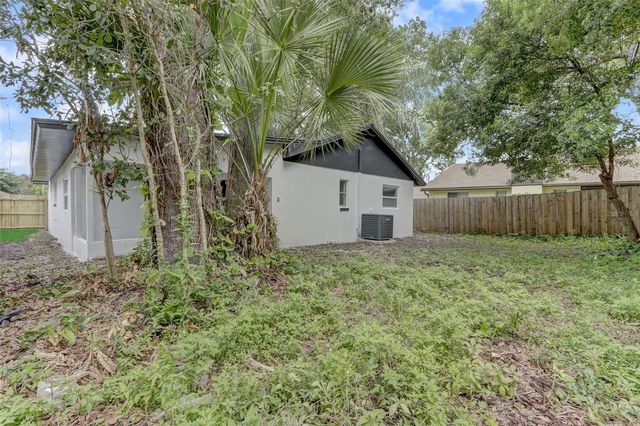 7711 LAKESIDE WOODS DRIVE, Orlando, FL 32810