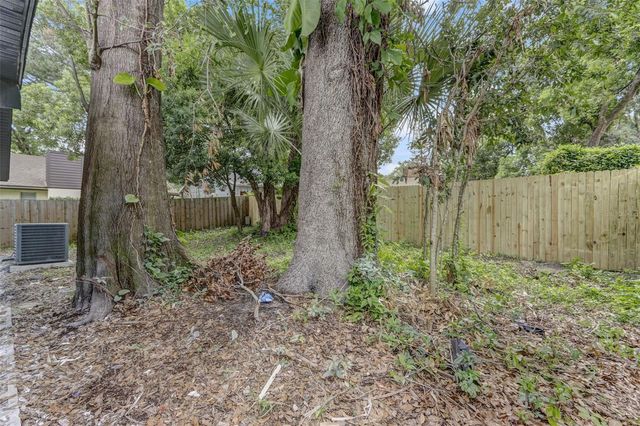 7711 LAKESIDE WOODS DRIVE, Orlando, FL 32810