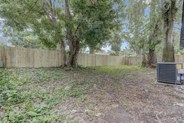 7711 LAKESIDE WOODS DRIVE, Orlando, FL 32810