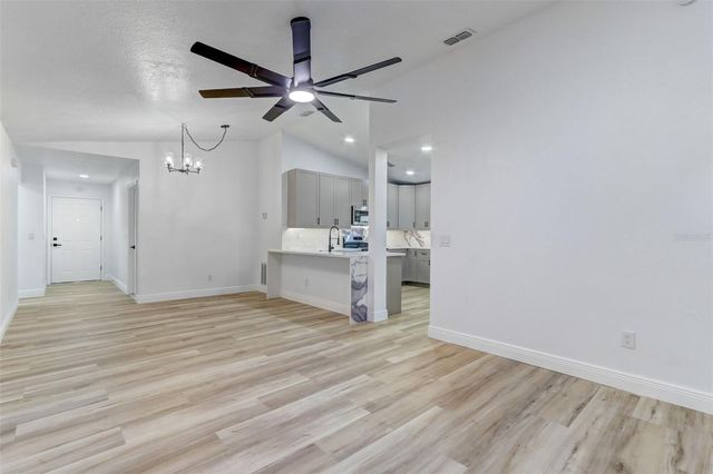 7711 LAKESIDE WOODS DRIVE, Orlando, FL 32810