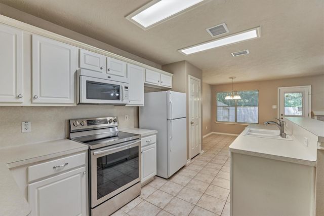 231 Blushwood Place, The Woodlands, TX 77382