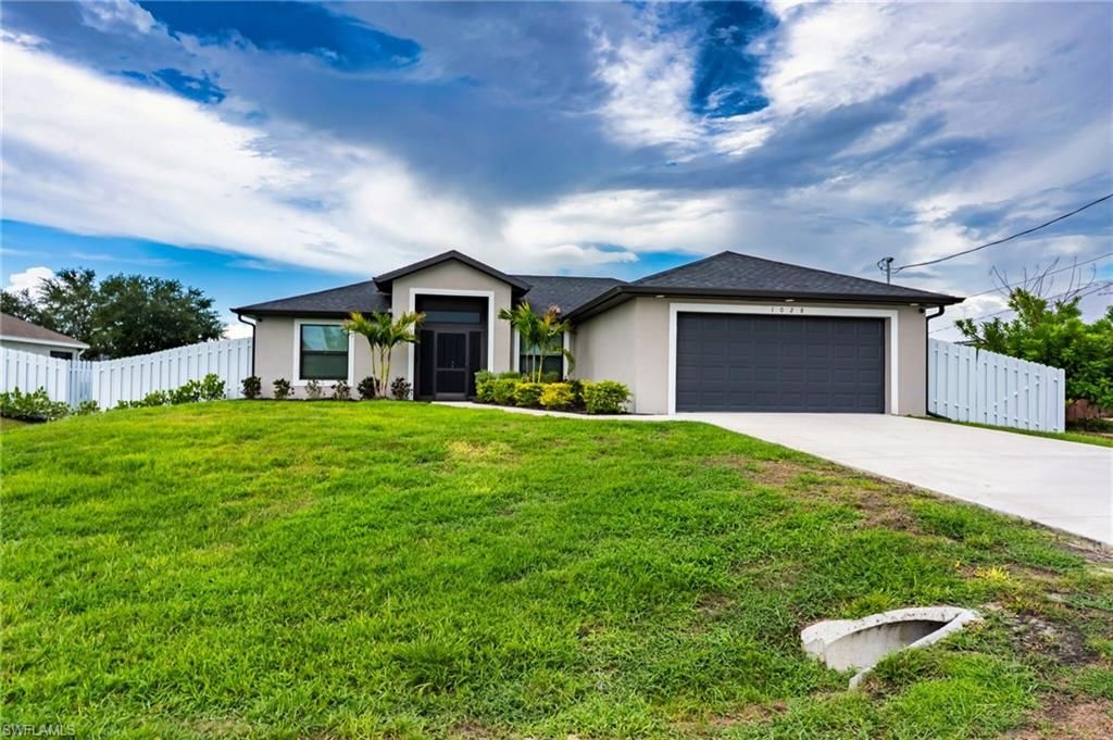 1028 Champion AVE, LEHIGH ACRES, FL 33971 — exterior