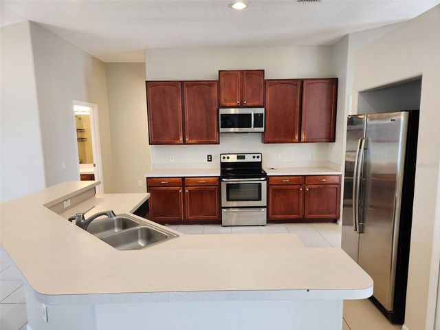 1007 DAMPIERRE COURT, Kissimmee, FL 34759