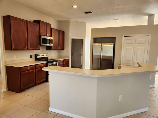 1007 DAMPIERRE COURT, Kissimmee, FL 34759