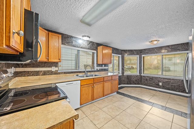 7719 Miller Glen Lane, Houston, TX 77072