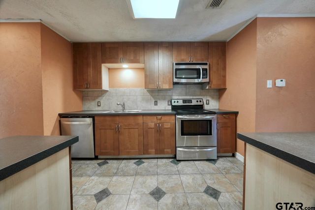 1505 Tanglewood Dr E, Hideaway, TX 75771