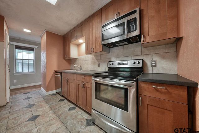 1505 Tanglewood Dr E, Hideaway, TX 75771