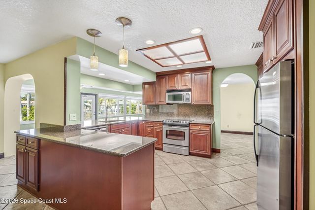 63 Yacht Haven Drive, Cocoa Beach, FL 32931