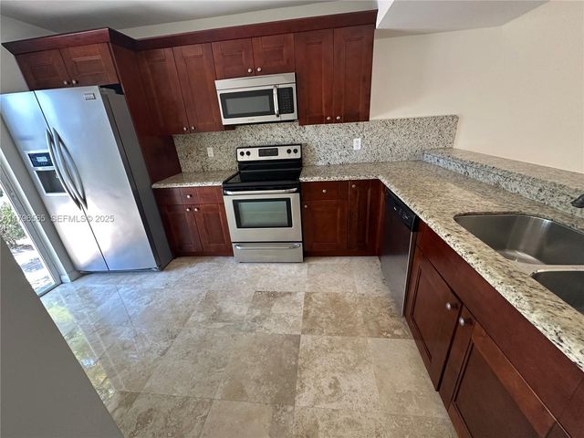 878 Crystal Lake Drive, Deerfield Beach, FL 33064