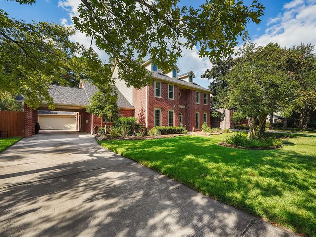 5 Hidden Pond Place, The Woodlands, TX 77381