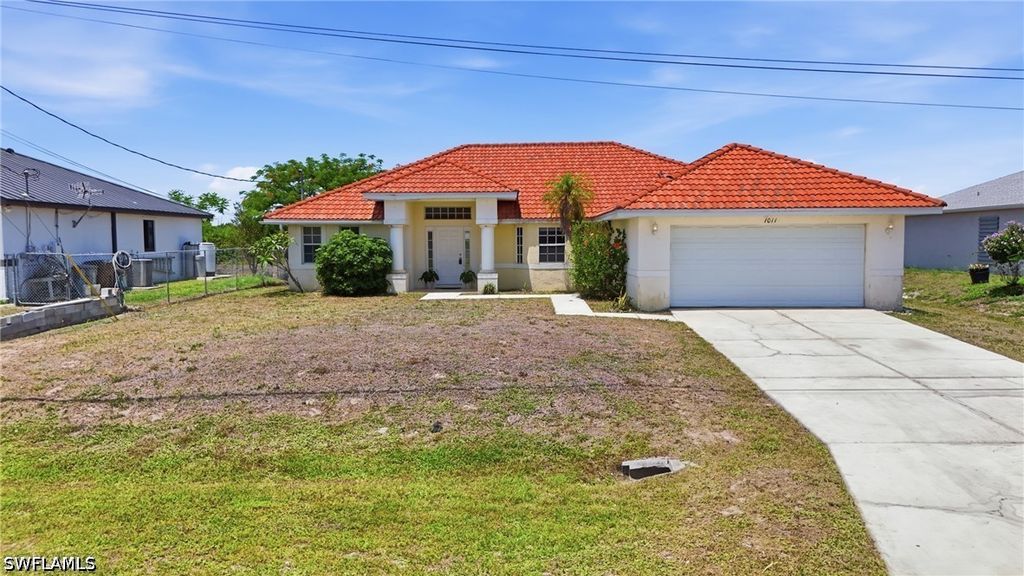 1011 Chadbourne AVE, Lehigh Acres, FL 33971
