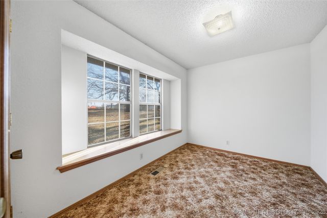 1032 S Cimarron Street, Catoosa, OK 74015