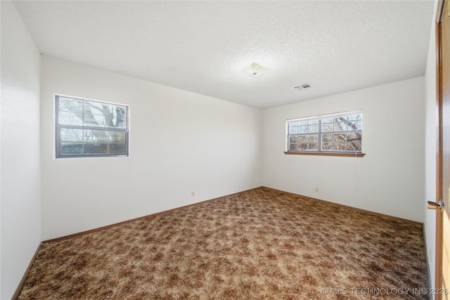 1032 S Cimarron Street, Catoosa, OK 74015