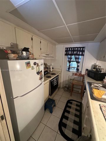 1050 E Sample Rd 208, Pompano Beach, FL 33064