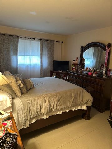 1050 E Sample Rd 208, Pompano Beach, FL 33064