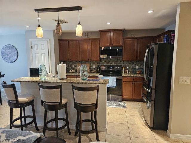 1206 SW Trafalgar PKWY, Cape Coral, FL 33991