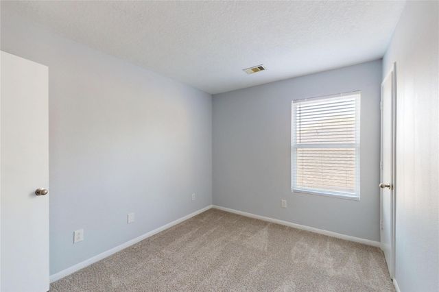 9877 Lace Flower Way, Conroe, TX 77385