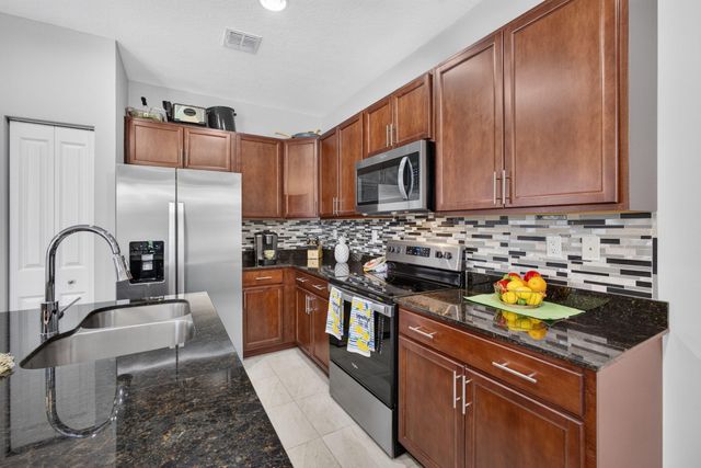 4004 SCREW PINE Cove, Riviera Beach, FL 33410