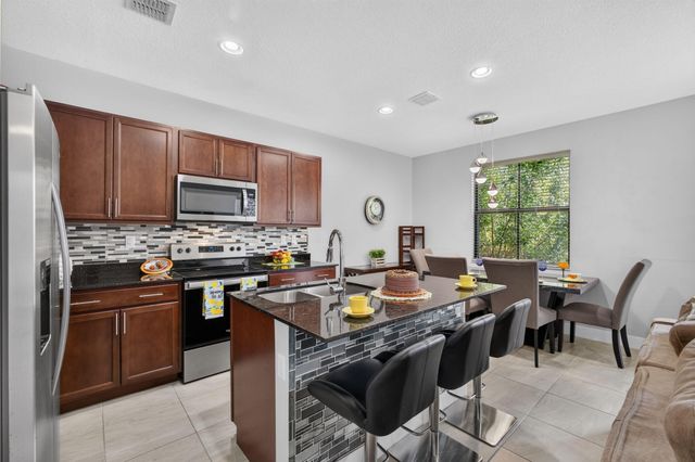 4004 SCREW PINE Cove, Riviera Beach, FL 33410
