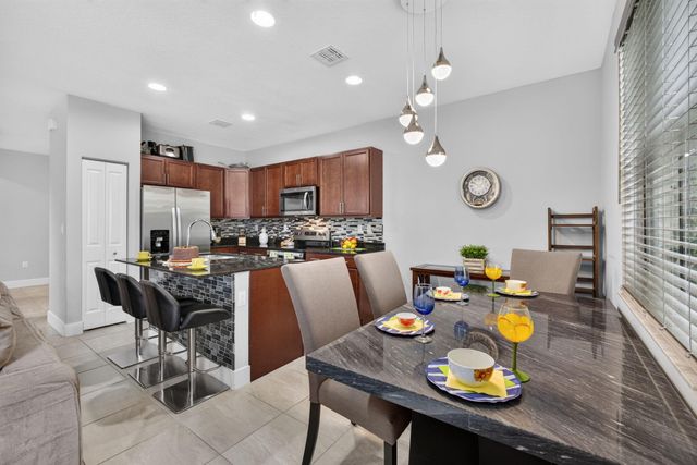 4004 SCREW PINE Cove, Riviera Beach, FL 33410
