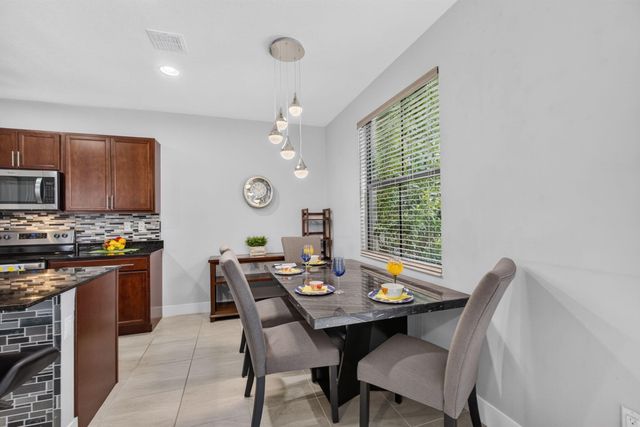 4004 SCREW PINE Cove, Riviera Beach, FL 33410