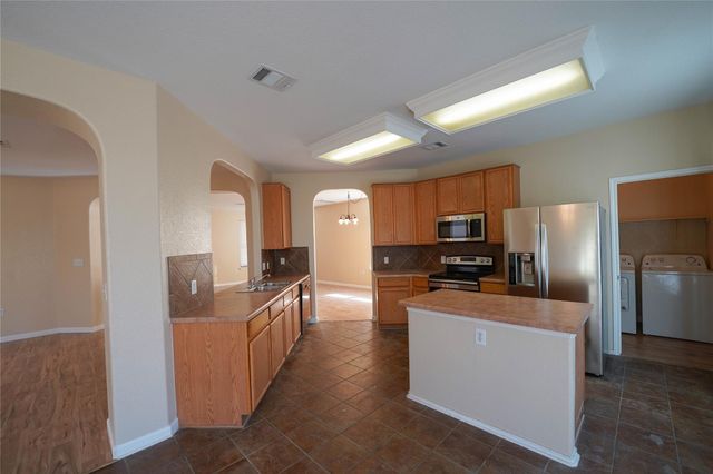 5520 Alomar CV, Del Valle, TX 78617