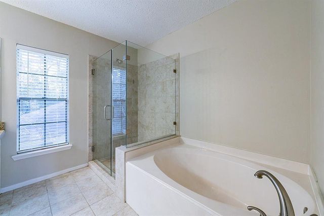 75 Breezy Point Place, The Woodlands, TX 77381