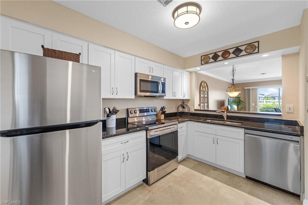 25494 Cockleshell DR 202, BONITA SPRINGS, FL 34135 — exterior